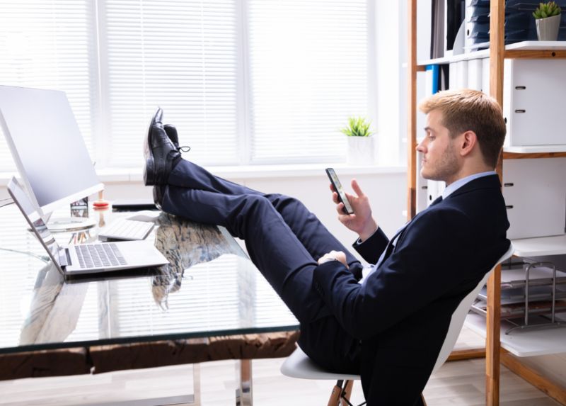 Feet up on desk